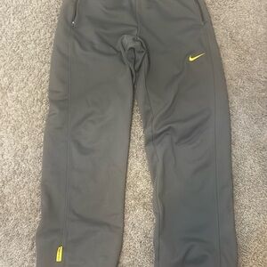 Nike Kids Dark Gray Joggers with Yellow Accents